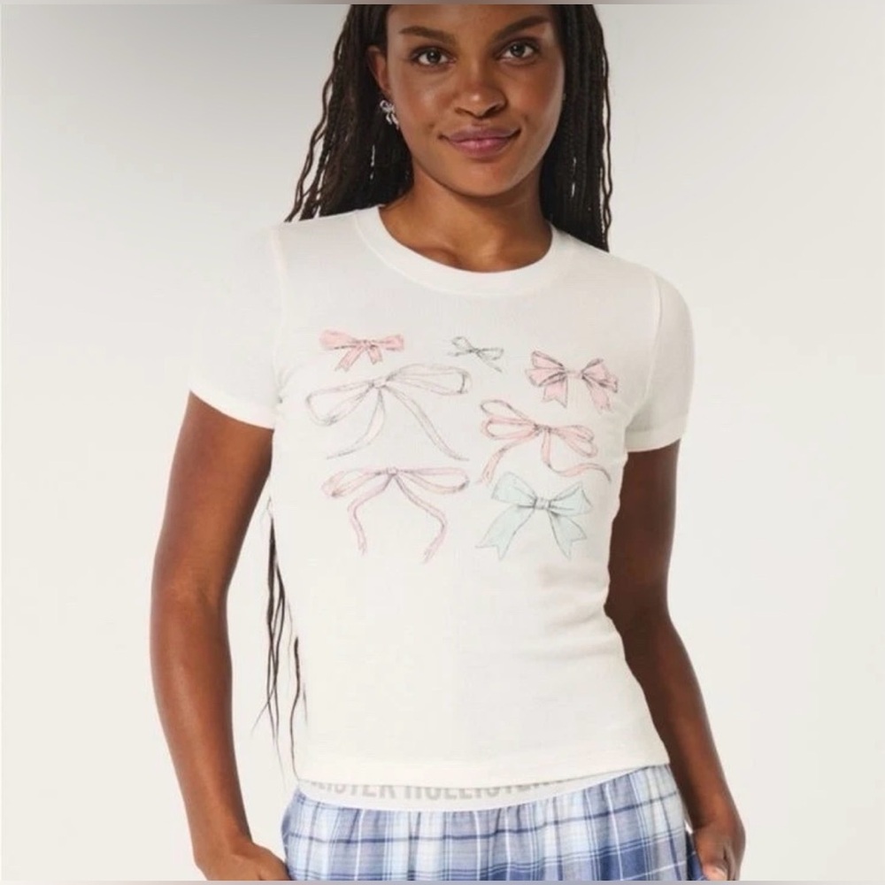 Hollister Women's White Ribbed Longer-Length Bow Graphic Baby Tee Size XL